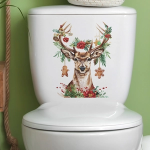 Christmas reindeer head sticker with flowers and gingerbread man on a white toilet tank