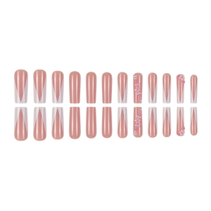 Nude pink press-on nails with white V-French tips, 3D flowers, and pearl accents