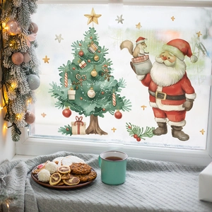 Christmas tree and Santa Claus wall stickers on window in a cozy winter home scene