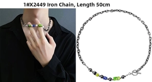 Detail of 50cm titanium steel necklace featuring color cubes, pearls and OT clasp
