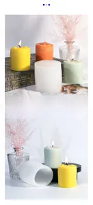 Detailed view of cylindrical Tai Chi silicone candle mold with finished aromatherapy candles