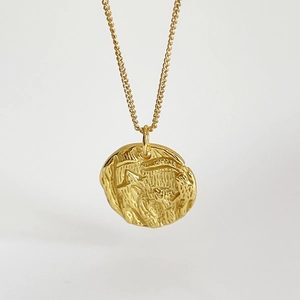 Elegant 925 sterling silver gold-plated coin necklace with hammered irregular texture