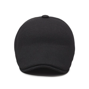 Men's black knit newsboy cap with thermal fleece lining and honeycomb texture design
