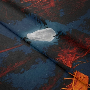 Detail showing the soft velvet texture and mystic forest print of the bohemian tapestry