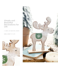 Close-up of Nordic wooden reindeer decor with snowflake pattern and white fur collar