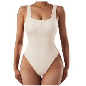 Detail of ribbed knit fabric texture on a beige U-neck tummy control bodysuit