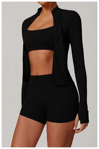 Three-piece black yoga set with full-zip long sleeve jacket and thumbhole sleeve detail