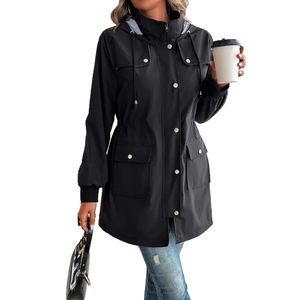Detail of black hooded windbreaker jacket with drawstring waist and stripe lining