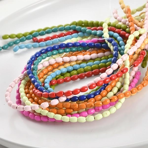 Vibrant turquoise oval rice beads in multiple colors for DIY jewelry making and crafts