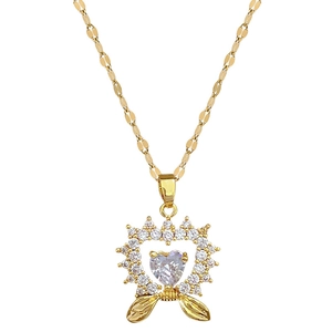Elegant gold titanium steel heart necklace with cubic zirconia and leaf pendant detail