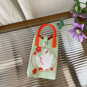 Green knitted phone bag with cute cartoon chicken and orange handles for women