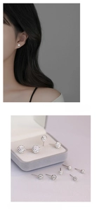 Detailed view of S925 sterling silver ball stud earrings and model wearing show