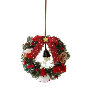 Classic Christmas wreath with Santa, gingerbread man, red bows, and bells on white background