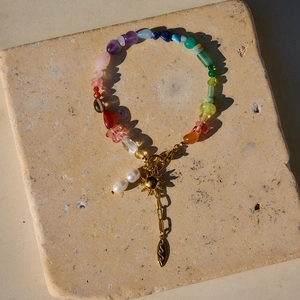Bohemian colorful natural gemstone bracelet with gold sun pendant and pearls