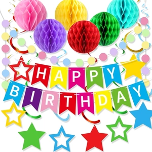 Vibrant rainbow paper honeycomb balls and stars with a Happy Birthday banner set
