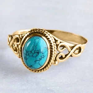 Retro hollowed-out ring with oval turquoise stone and gold-plated scroll patterns