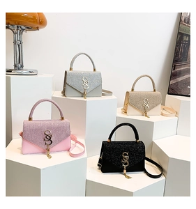 Collection of glitter flap bags with SS metal buckles in pink, gray, gold, and black