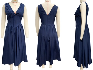 Three-view display of navy blue V-neck sleeveless maxi dress with bow detail