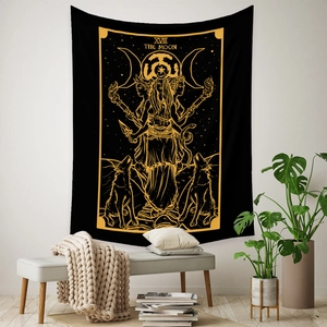 Detailed view of The Moon Tarot tapestry with golden occult symbols on a black fabric wall hanging