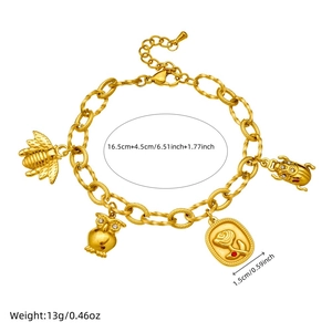 18K gold plated stainless steel bracelet with bee and floral charms on white background