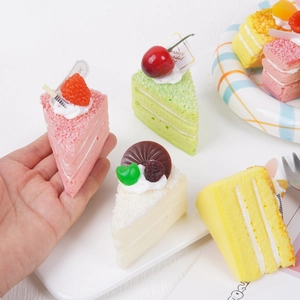 Realistic colorful triangle mousse cake squishy toys with faux fruit and dessert plugins