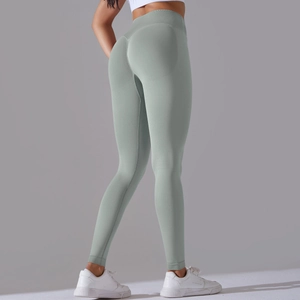 Detail view of high-waist seamless yoga leggings with scrunch butt lift in sage green