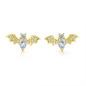 Gold bat-shaped stud earrings with sparkling cubic zirconia stones on white background