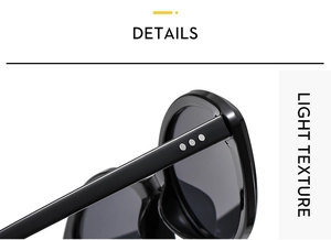 Macro view of black cat eye sunglasses hinge with metallic dot accents and light texture