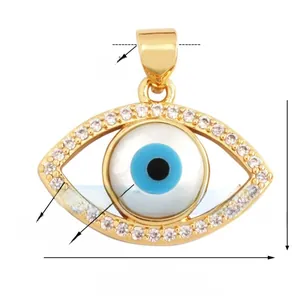 Detailed view of evil eye charm with natural shell base and white zircon pavé setting