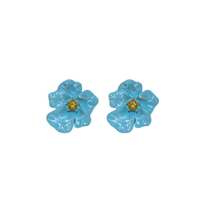 Floral stud earrings with light blue enamel petals and yellow gemstone centers