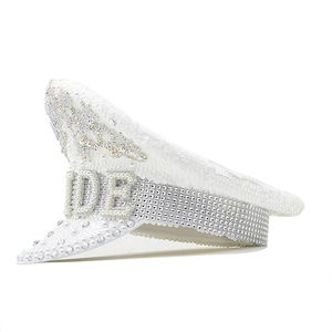 Detailed side view of white bridal captain hat with sequins, pearls and BRIDE lettering