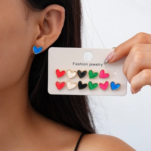 Set of six colorful heart enamel stud earrings in diverse shades for a trendy look