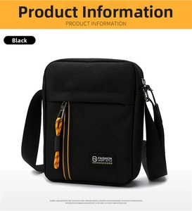 Detail of black oxford shoulder bag with yellow zipper and brand tag on front pocket