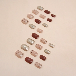 Short square press-on nails in caramel brown and champagne glitter finish