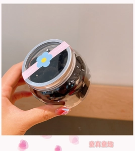 Jar of high elasticity black hair ties for girls with a transparent ball-shaped container