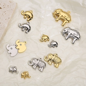 Polished stainless steel elephant pendants in gold and silver with zircon accents