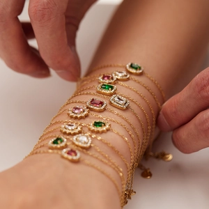 Chic gold-plated stainless steel bracelets with colorful zircon geometric pendants on wrist