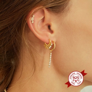 S925 sterling silver rainbow earrings set with colorful cubic zirconia on female ear