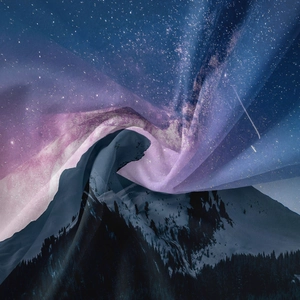 Detail view of starry sky and mountain tapestry showing the soft fabric texture and draping