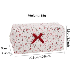 Floral makeup bag featuring a red bow and detailed dimensions 20.5x9x9.5cm