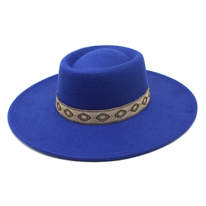 Detail of royal blue wool fedora hat with ethnic diamond pattern embroidered ribbon band