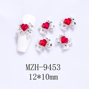 Detail of 12x10mm silver bow nail art charms with red heart rhinestones and 5-piece set