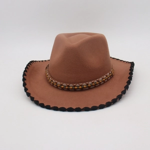 Brown felt cowboy hat with ethnic beaded band and scalloped edges for travel and outdoor wear
