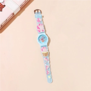 Detail of children's blue silicone watch strap with 3D unicorn and rainbow patterns