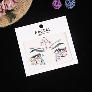 Face gem stickers with colorful rhinestones for eyes and forehead party makeup look