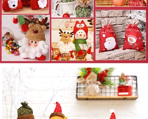 Close-up of festive Christmas gift bags with Santa, snowman and elk designs