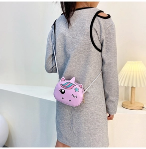 Pink unicorn crossbody bag for girls with star details and metallic braided strap