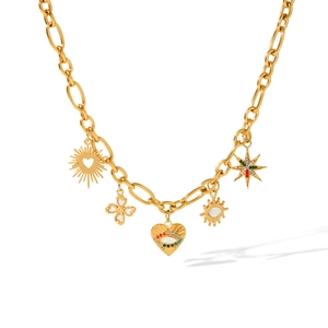 Golden Evil Eye charm necklace with sun and star pendants on a thick link chain