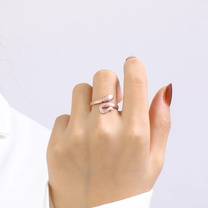 Adjustable rose gold snake ring in stainless steel with detailed scale texture for women