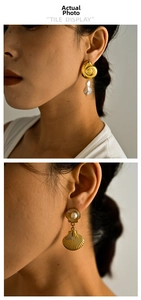Detailed view of 18K gold plated seashell earrings with freshwater baroque pearls